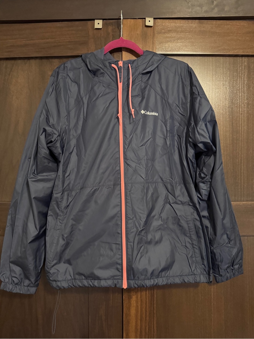 Columbia Women’s Navy Blue Rain Jacket with Pink Accents and Fleece Lining
